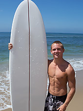 Cute blond surfer Noel strokes at Sean Cody